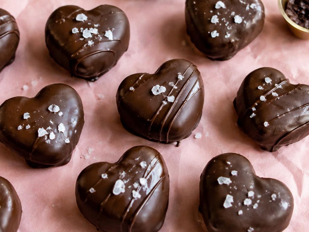 Heart-shaped chocolate date caramels